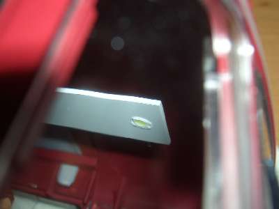 This LED is located a bit behind the driver's seat