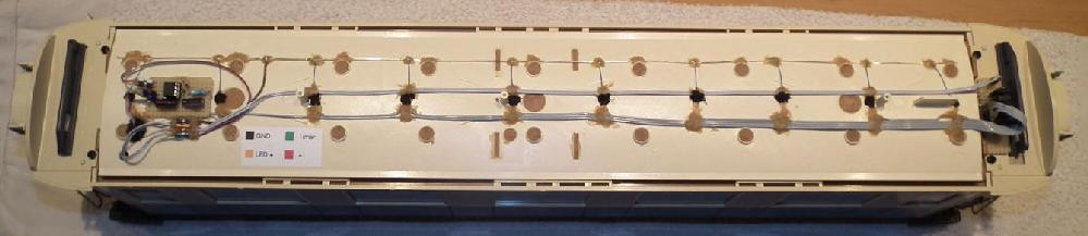 Harness and electronics in the spacing beneath the roof